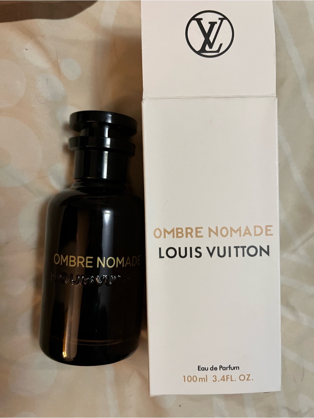 Louis Vuitton Ombre Nomade Black and Gold Bottle